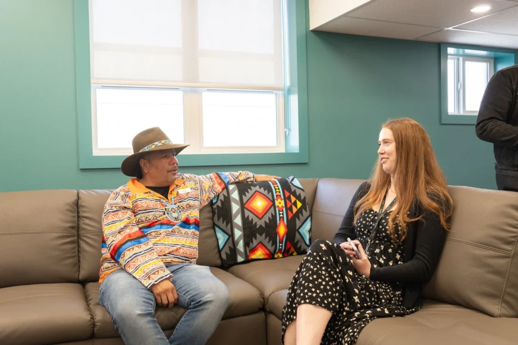 A New Space for Families to Flourish chatting on couch