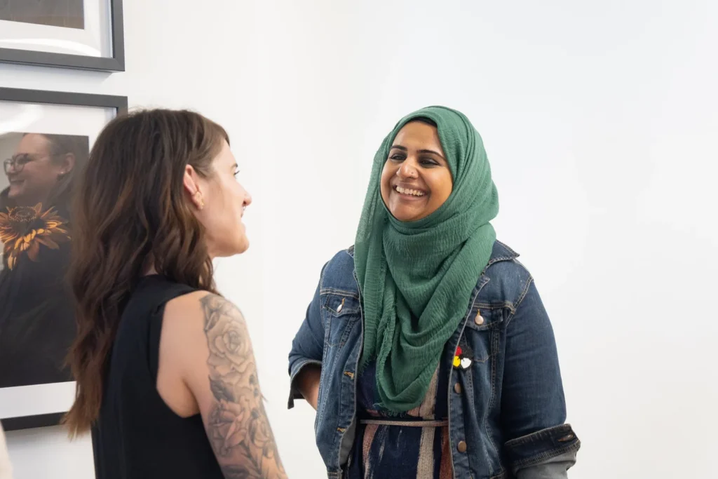 A New Space for Families to Flourish two woman chatting