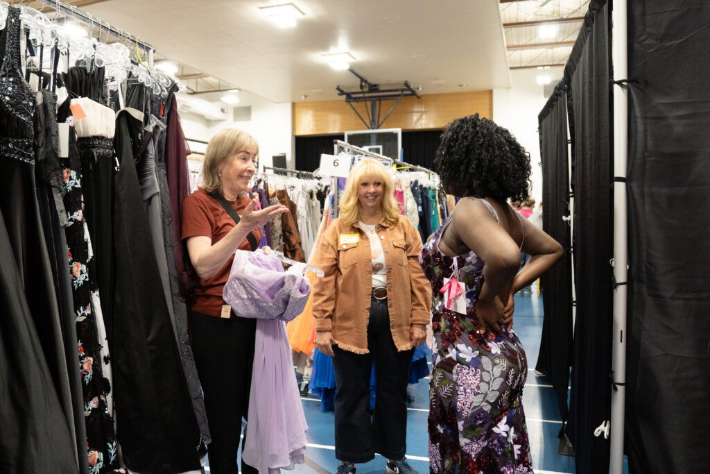Trellis volunteers help a student at GRADitude 2026