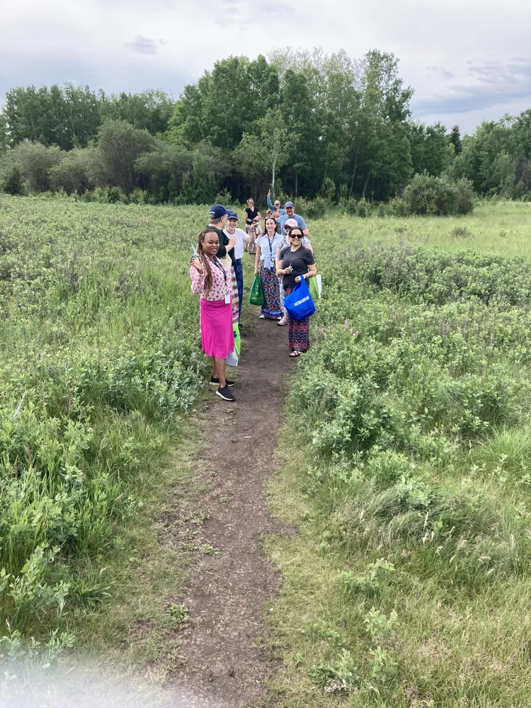 ReconciliACTION - From Awareness to Action walking along a dirt road