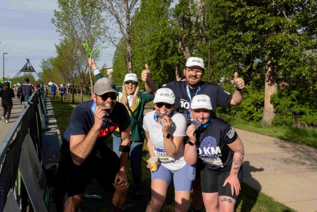 Team Trellis Makes an Impact at the 2026 Servus Calgary Marathon Trellis Servus Calgary Marathon runners at the finish line